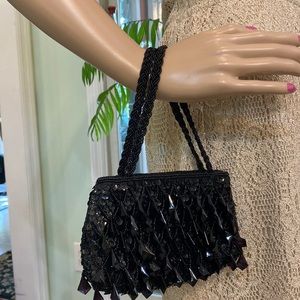 La Regale black beaded evening purse.